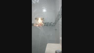 Taking a shower.