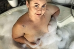 Taking a bubble bath
