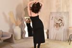 an elegant woman in a black dress