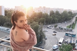 on the balcony naked :P