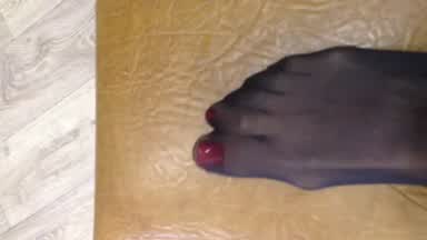 Toes feet in black nylon