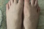 feet with sparkly pink polish