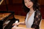 Piano teacher in concert hall