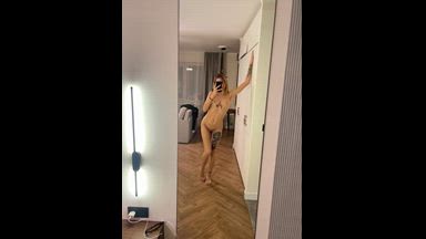 sweet girl spinning in the mirror
