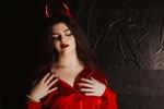 A devil costume and the fire of Christmas in one g