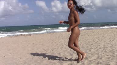 Dancing Naked at the beach.