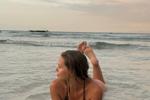 Black Swimsuit And Warm Sea