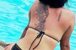 In the pool and scantily clad
