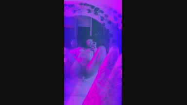 ridding dildo at neon night