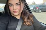 behind the wheel)