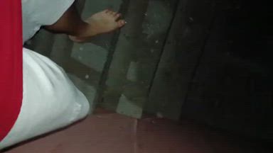 the alpha's feet in the dirty street