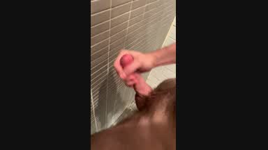 Cumshot on bathroom wall