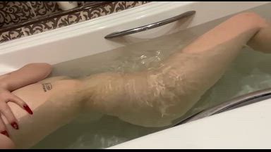 completely naked in the bathtub