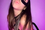 in a leather mask