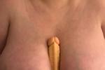 dildo in between boobs