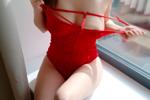 In red by the window