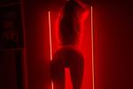 Slender forms in red light
