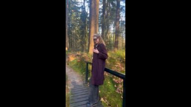 Sophie in a park, getting cheeky 😏💚