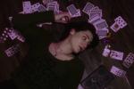 Cards, money, two guns.