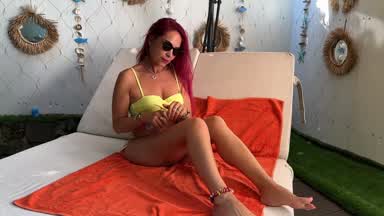 Just a hot redhead and her body being oiled.