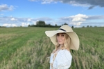 Natural naked girl in the field
