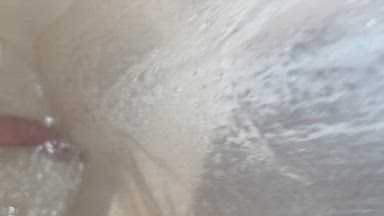 Close up shower head on pussy