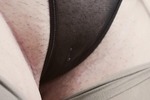 Pierced clit with a ring on the leash