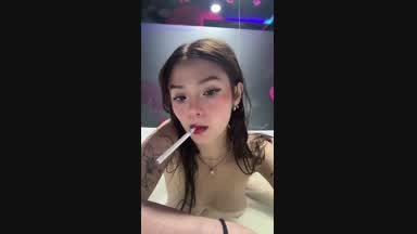 Sexy smoking naked in the jacuzzi
