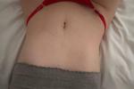 in red panties on the bed