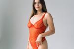 girl in a red bodysuit and stockings