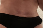 Wearing girl panties, dick hard showing and ass