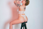 rebel Alice in lingerie and leather jacket