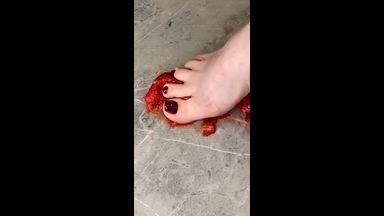 Crush food with bare feet, nylons & heels