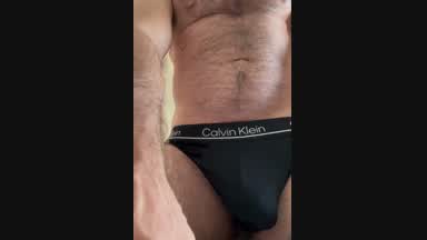 Playing with his thick cock