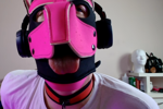 Pink pup sticks his tongue out for you
