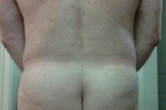 behind