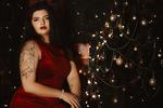 A Christmas fairy by the Christmas tree