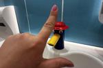 L oser sign in public toilet