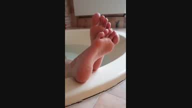 my wet feet in the bathroom