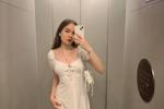 oh I'm here in a white dress