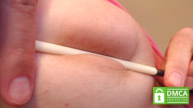Brush on the puffy nipple