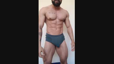 Ragnar flexing muscles