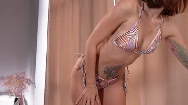 Dancing in a swimsuit and undressing