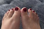 Red pedicure on my feet 🦶