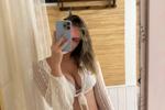 I'm wearing a white swimsuit