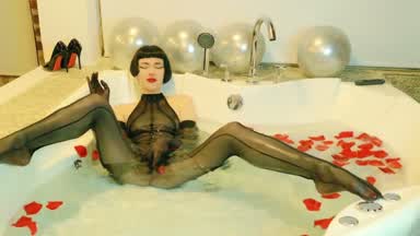 Enjoying to be in wet nylon bodysuit