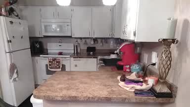 BBC glasses, red lingerie kitchen countertop play