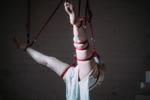 suspended in the air by ropes