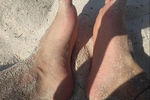feet on the beach