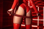 Mistress's ass in red latex